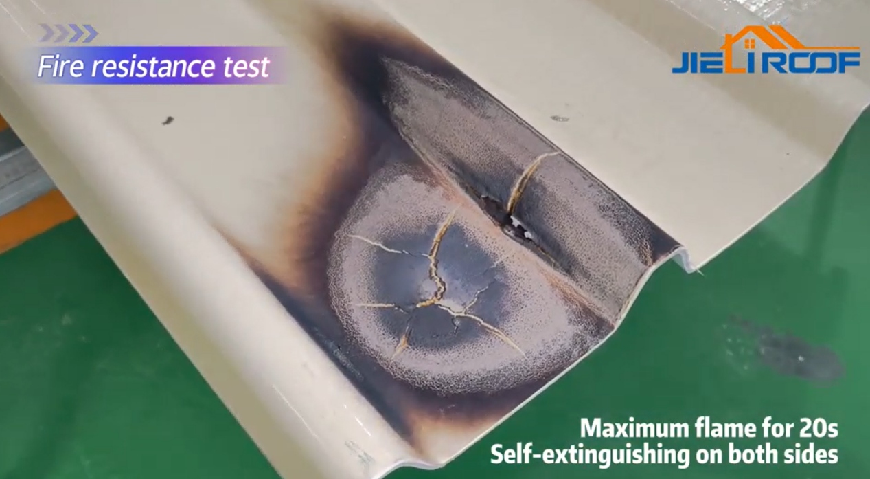 a fire resistance test of a jie li roof sheet, showing burn marks and cracks, with self-extinguishing properties after 20s of maximum flame exposure on both sides
